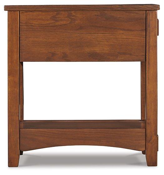 Mesa auxiliar Breegin junto al sillón