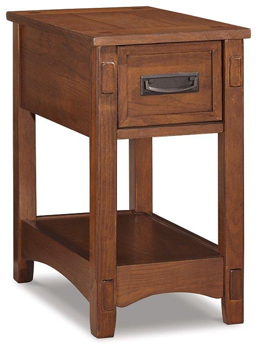 Mesa auxiliar Breegin junto al sillón