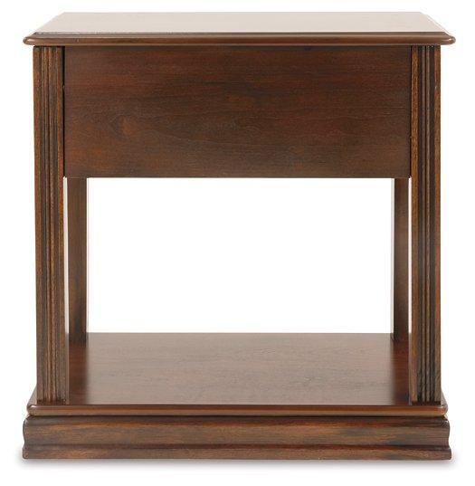 Mesa auxiliar Breegin junto al sillón